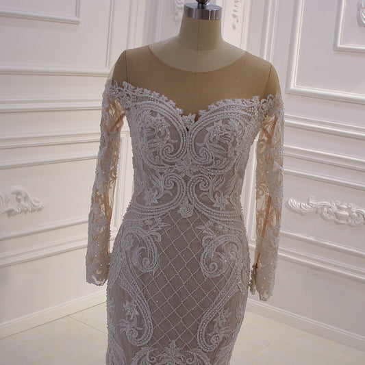 Theresa's Bridal 430 Lace embroided fabric long sleeve Mermaid wedding dress.