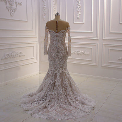 Theresa's Bridal 430 Lace embroided fabric long sleeve Mermaid wedding dress.